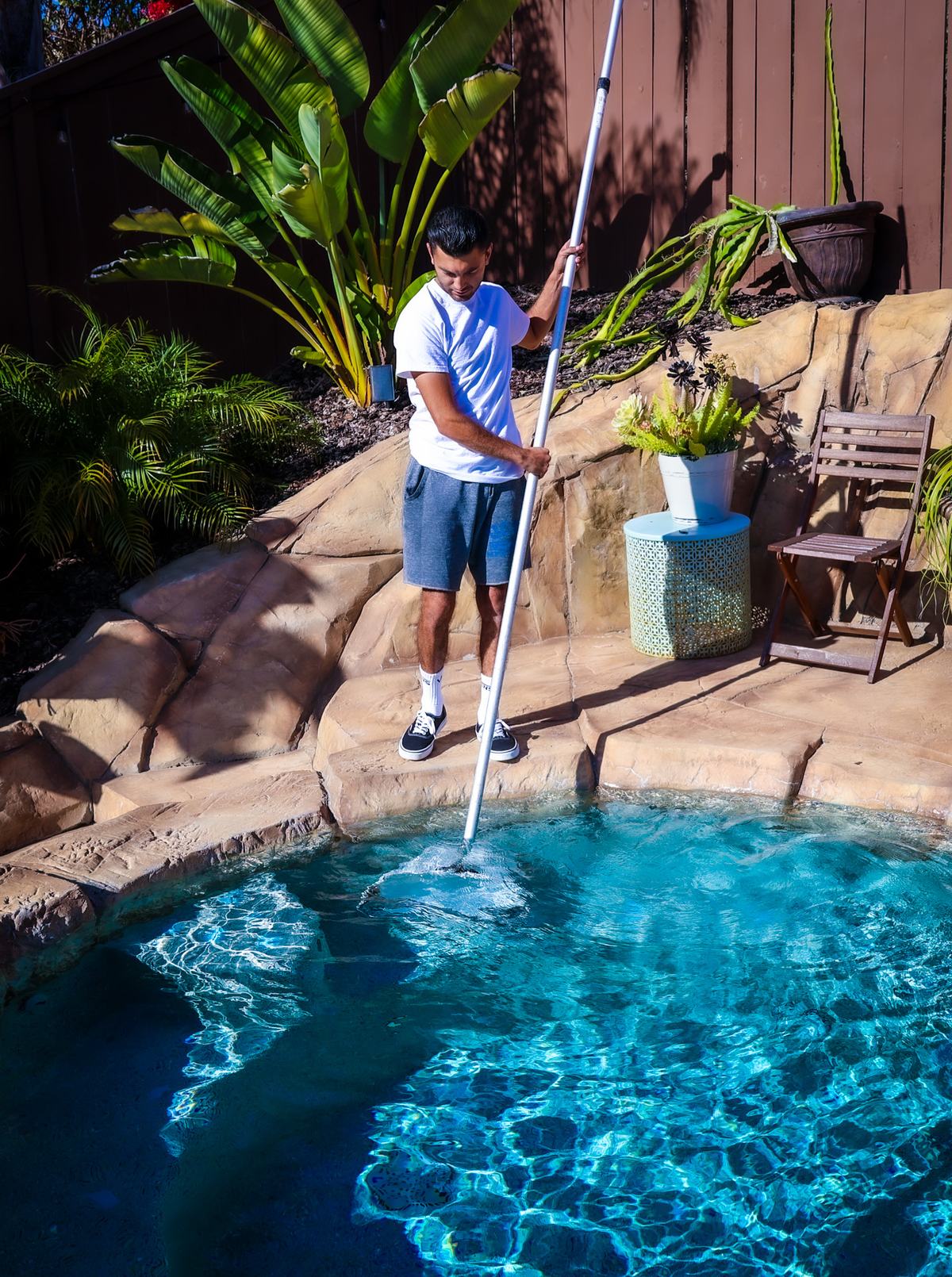 A Clearwater technician servicing a pool