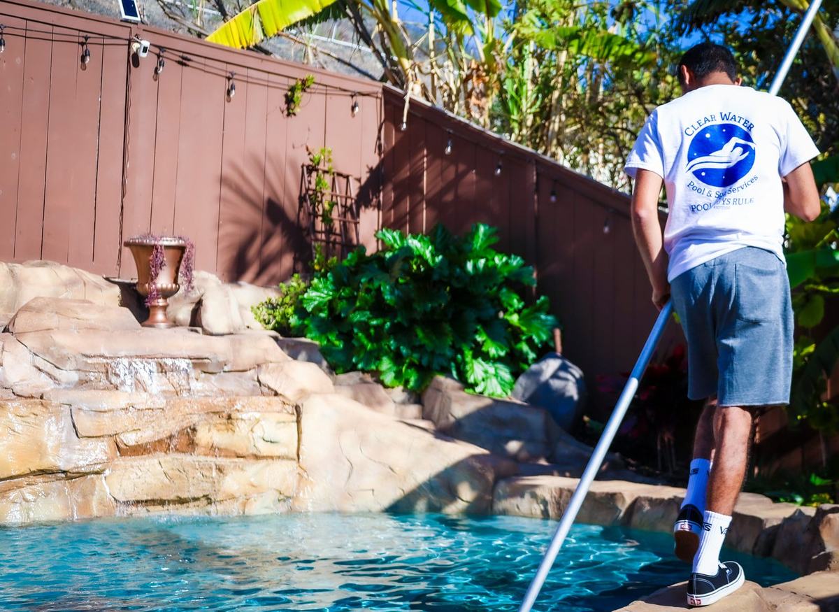 A Clearwater technician servicing a pool
